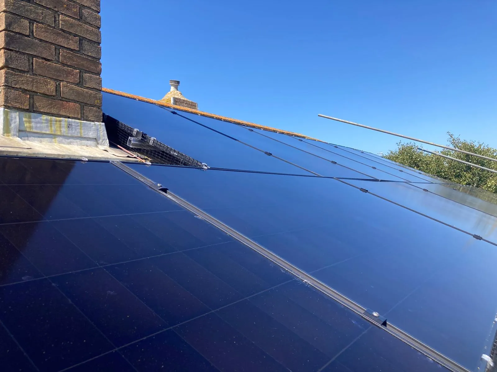 A solar panel on the roof of a building.