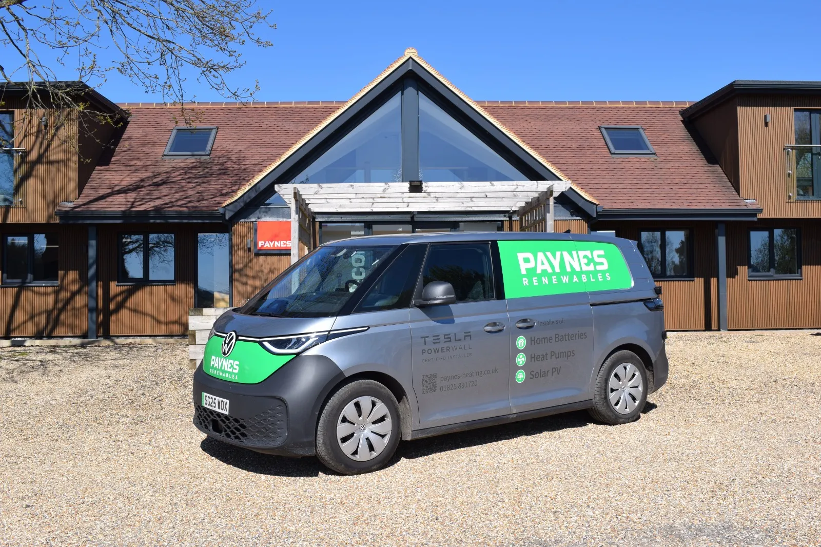 A van parked in front of a house.