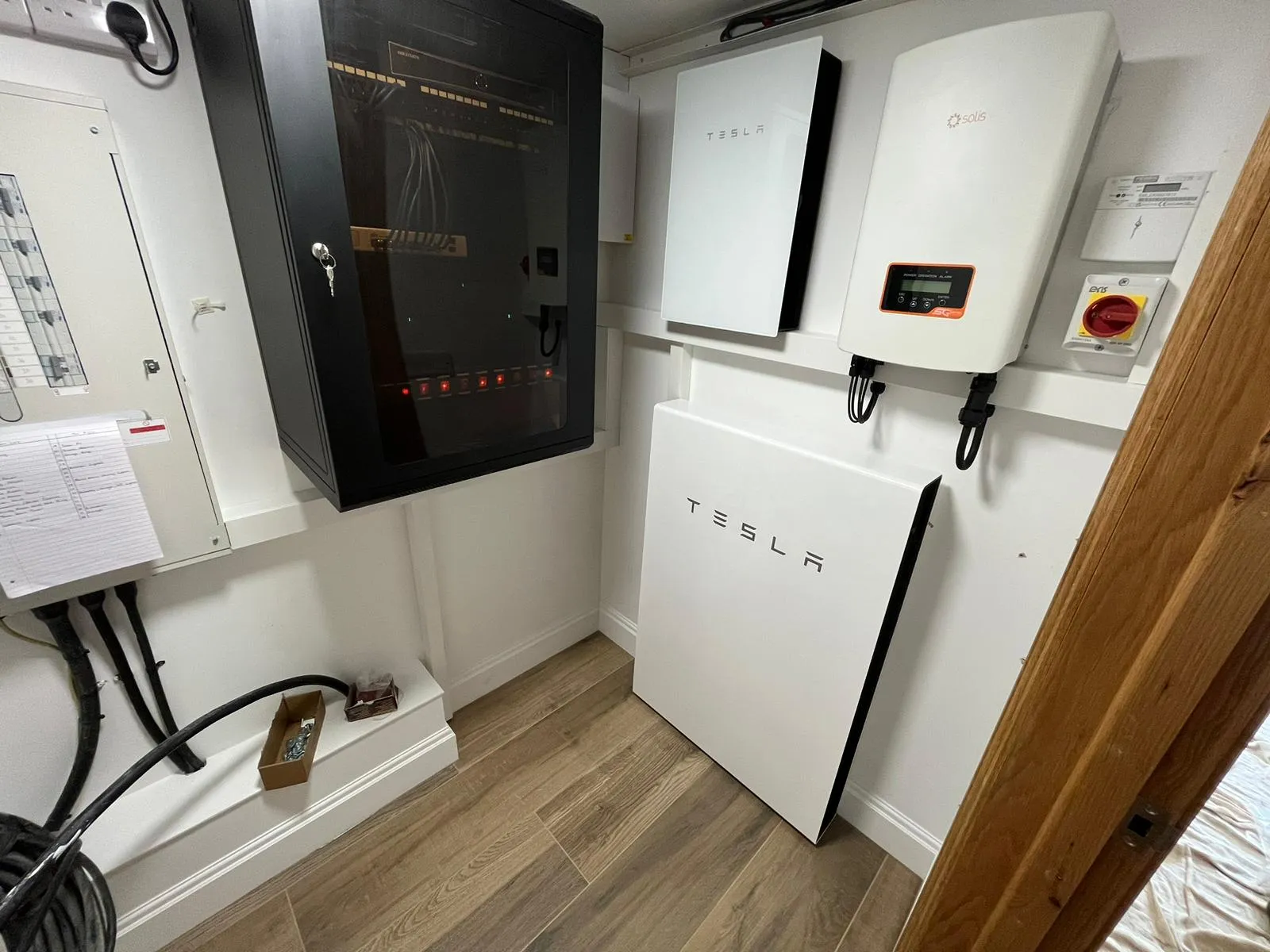 A white refrigerator freezer sitting inside of a kitchen.
