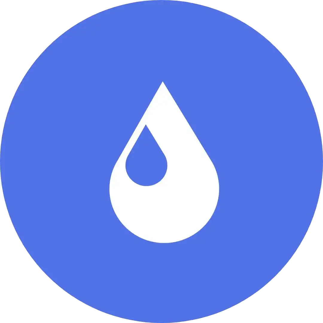 A blue circle with a drop of water on it.